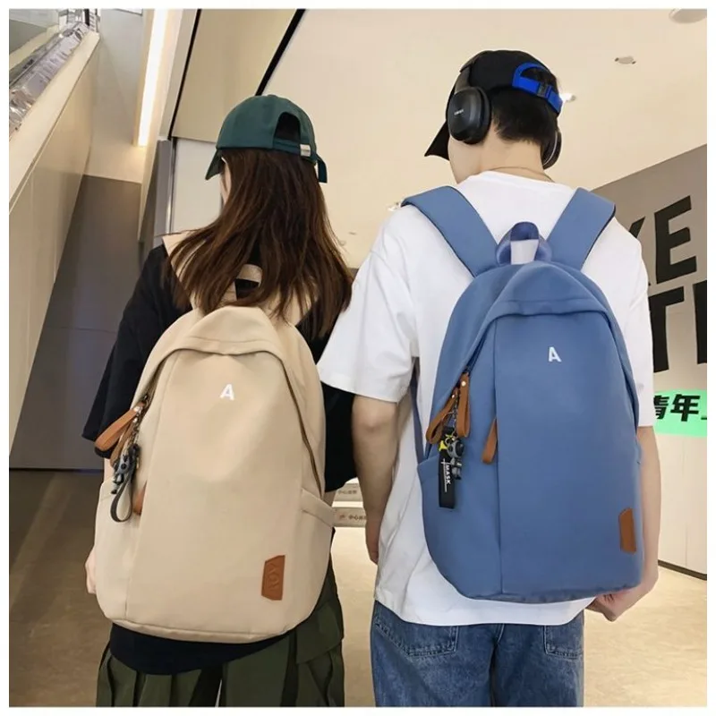 

Рюкзак. Легкий. Водонепроницаемый. Большая емкость. Рюкзак. Студент. Приготовитель. Школьная сумка. Сплошной цвет. Открытый. Досуг Путешествие