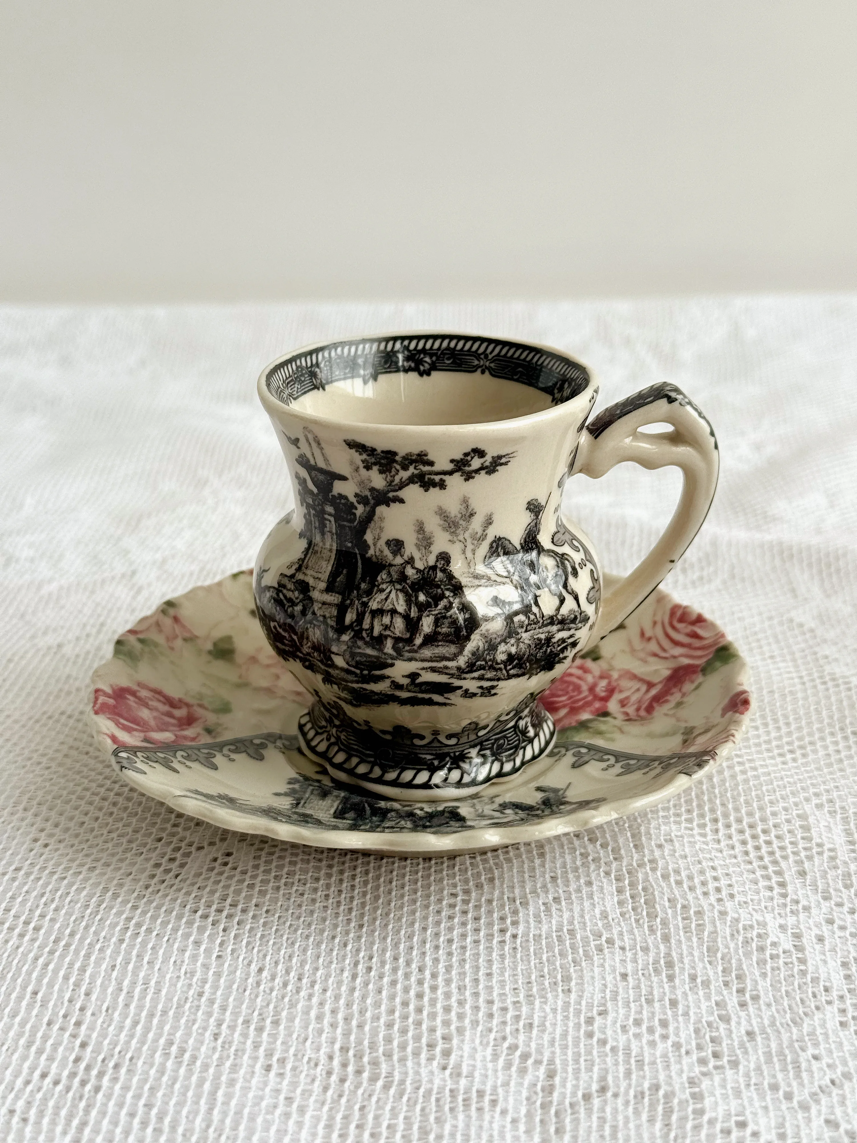 Middle aged rose warhorse black porcelain glazed medium color coffee cup