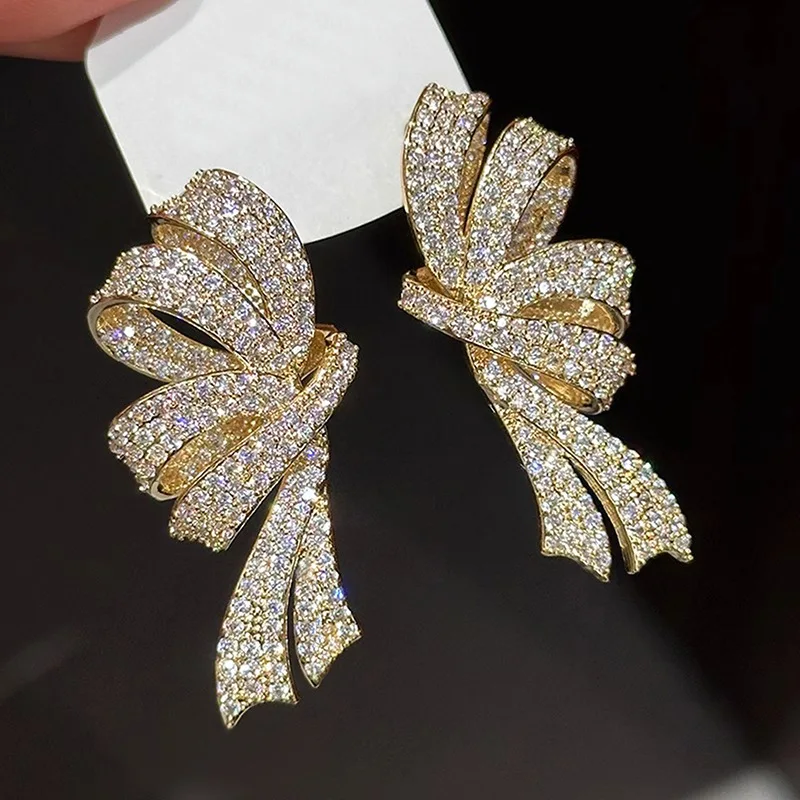 ZAKOL Luxuriöse Voll-Pavé-Zirkonia-Ohrstecker mit Schleifen-Design für Damen, Funkelnde CZ-Knoten-Hängeohrringe, Hochzeits- und Party-Schmuck – Detail 5