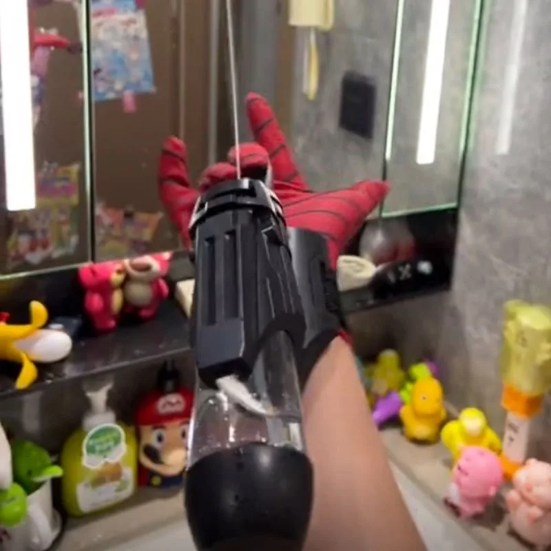 Lanzador eléctrico de prensa de muñeca Spider para niños, pistola de agua de ráfaga, brazo portátil, juguete para fiesta, regalo Popular, 2024