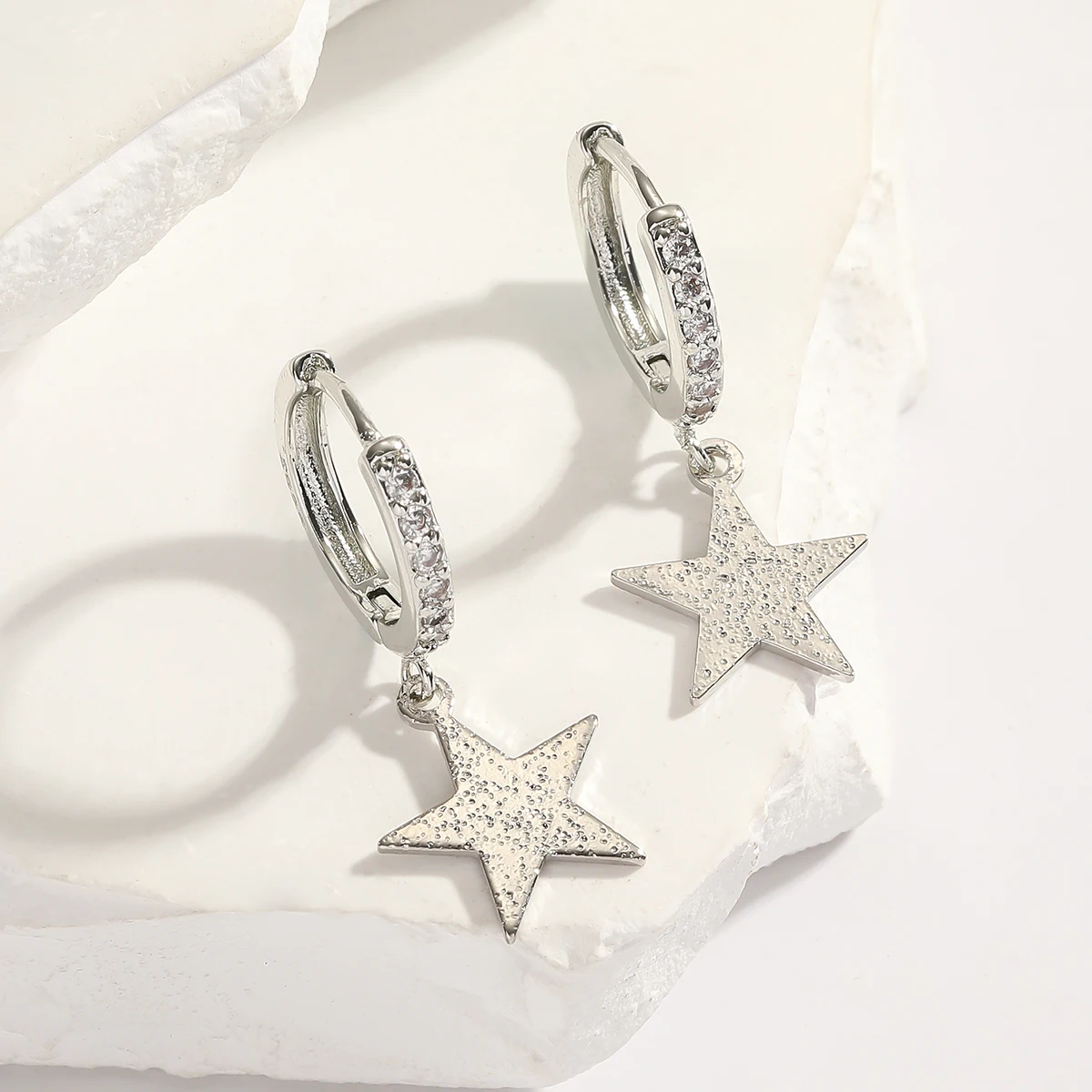 A set of silver-plated earrings is suitable for women and girls to wear popular star pattern style fashion jewelry suitable for