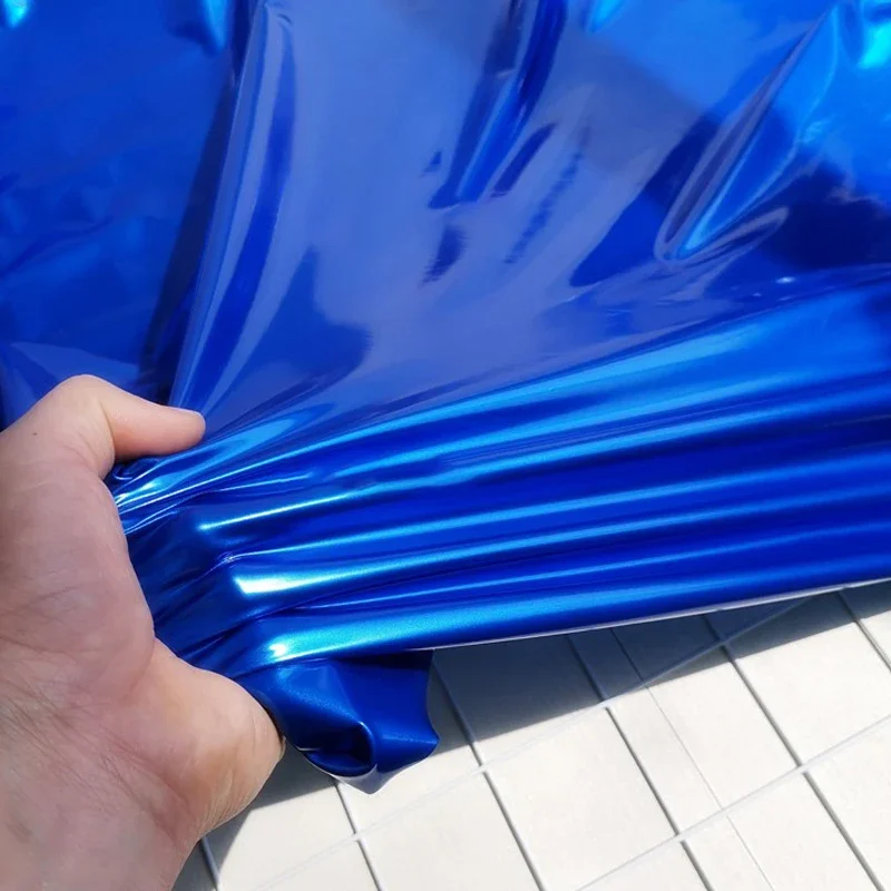 

Shiny Glossy Vinyl Pu Leather Fabric Soft Stretch Knitted Mirror Finish Ideal for Bags Costumes and Upholstery By The Yard