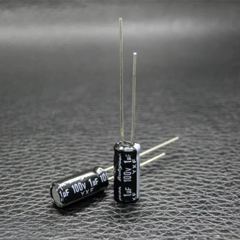 (2pcs)1uf100v Rubycon YXF 100v1uF Aluminum electrolytic capacitor with high frequency and low resistance 5 * 11mm Through Hole
