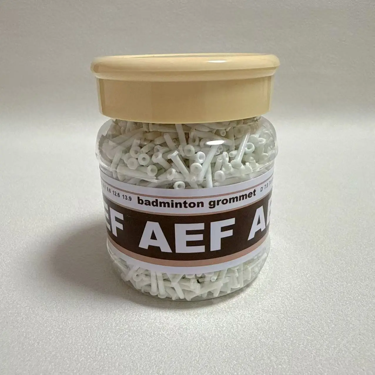 

Badminton Racket Grommet Set - Single & Double Hole Assortment in White Bottle