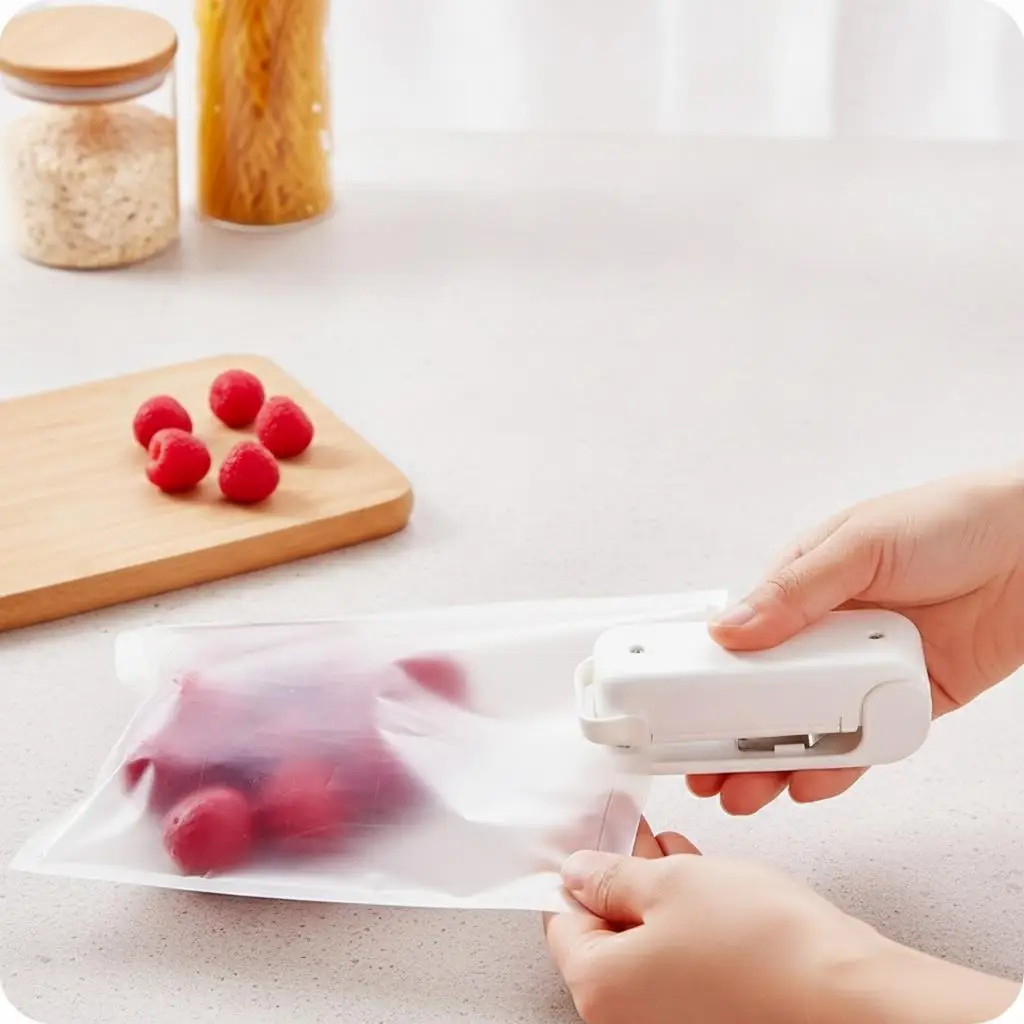 

Portable Handheld Mini Food Sealer Battery Powered Compact Pressure Heat Sealer Machine Suitable for Home and Outdoor Use Easy to Operate for Food Freshness Preservation Plastic Storage Bags Battery Not Included