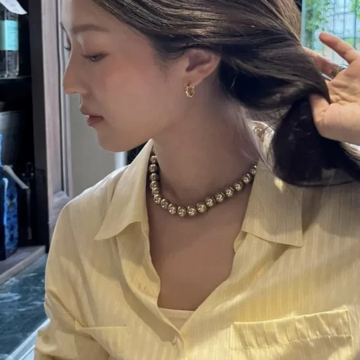 ゆったりとしたロングスリーブの女性用快適で通気性のあるスリムフィットの縦縞柄のゆったりとしたトップス、ファッショナブルなカジュアルウェア