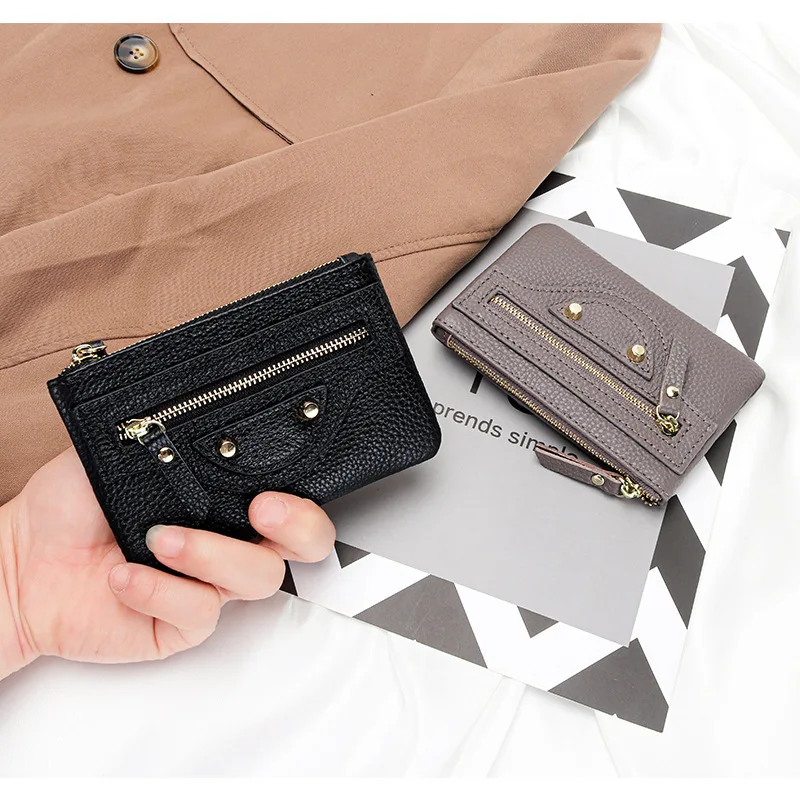 2025 رائجة البيع جلد طبيعي محفظة نسائية للعملات المعدنية المرأة قصيرة السائق نمط المحفظة متعددة الوظائف المفاتيح حقيبة المال العصرية