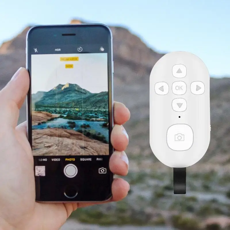 กล้องชัตเตอร์ระยะไกลไร้สายกล้องชัตเตอร์ Selfie ปุ่ม Clicker แบตเตอรี่ลิเธียมแฮนด์ฟรีเทคโนโลยีรูปภาพวิดีโอ