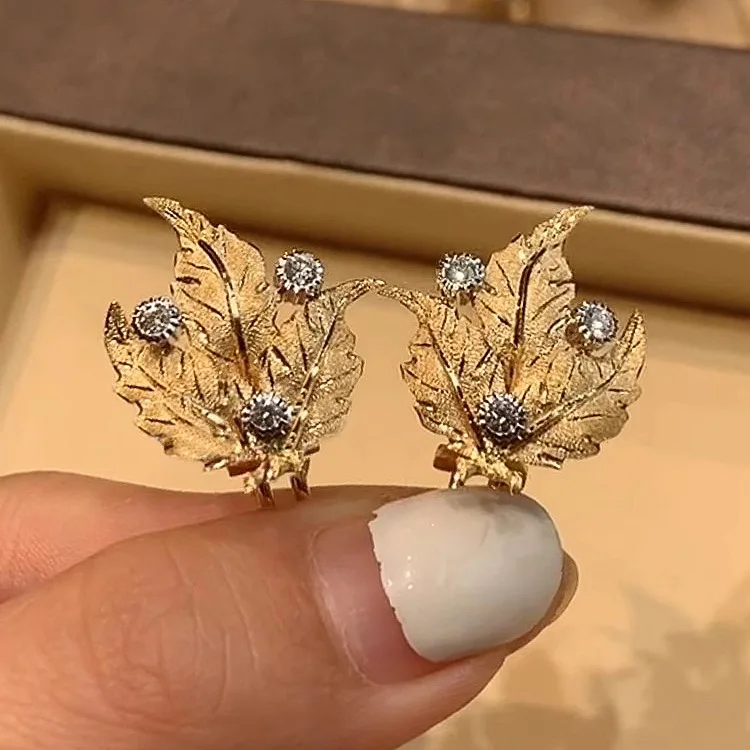 Brushed woven grape leaf silver earrings, high-end two-color gold maple leaf stud earrings, ear shot for women