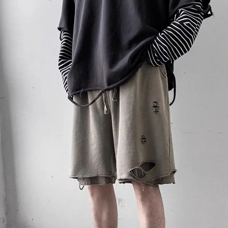 

Fashion High Street Ripped Men Summer Loose Korean Style Fashion Fake Two-pin Pants