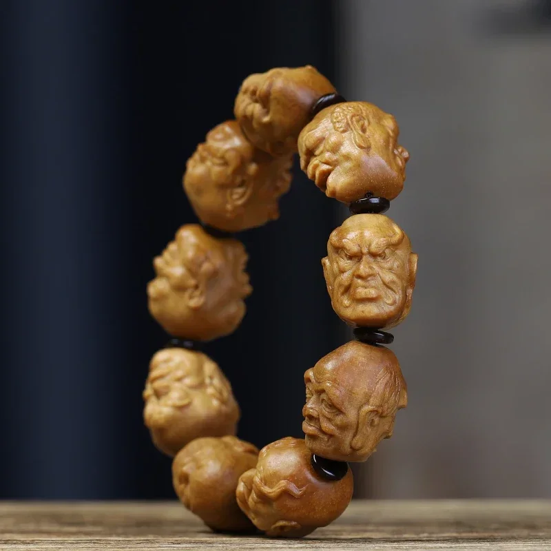 

UMQ Double sided carved eighteen Arhat sandalwood Buddha beads bracelet for men and women