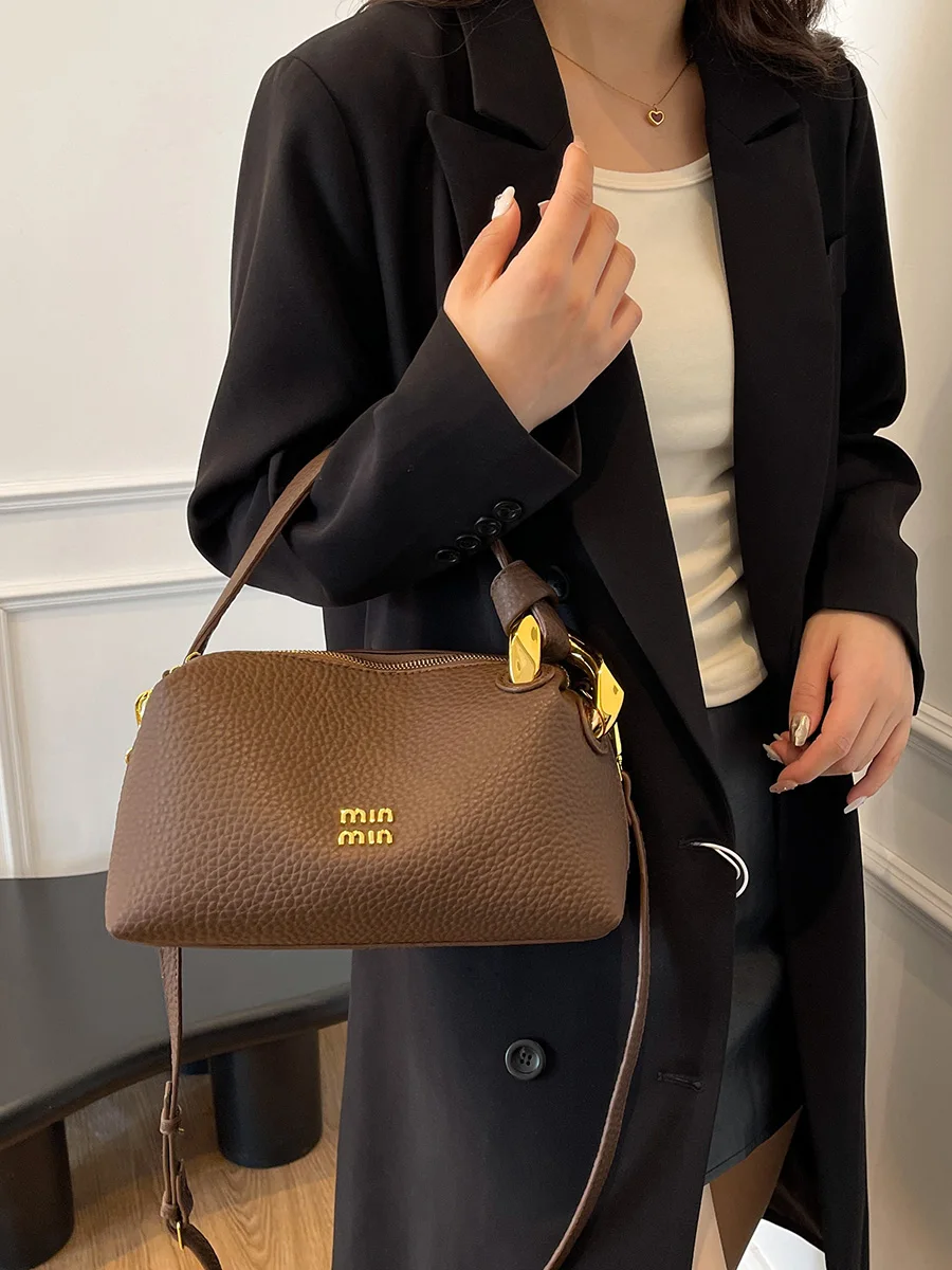 

Light luxury designer brand-name bag women's 2025 niche portable pillow bag western style all-match one-shoulder messenger bag
