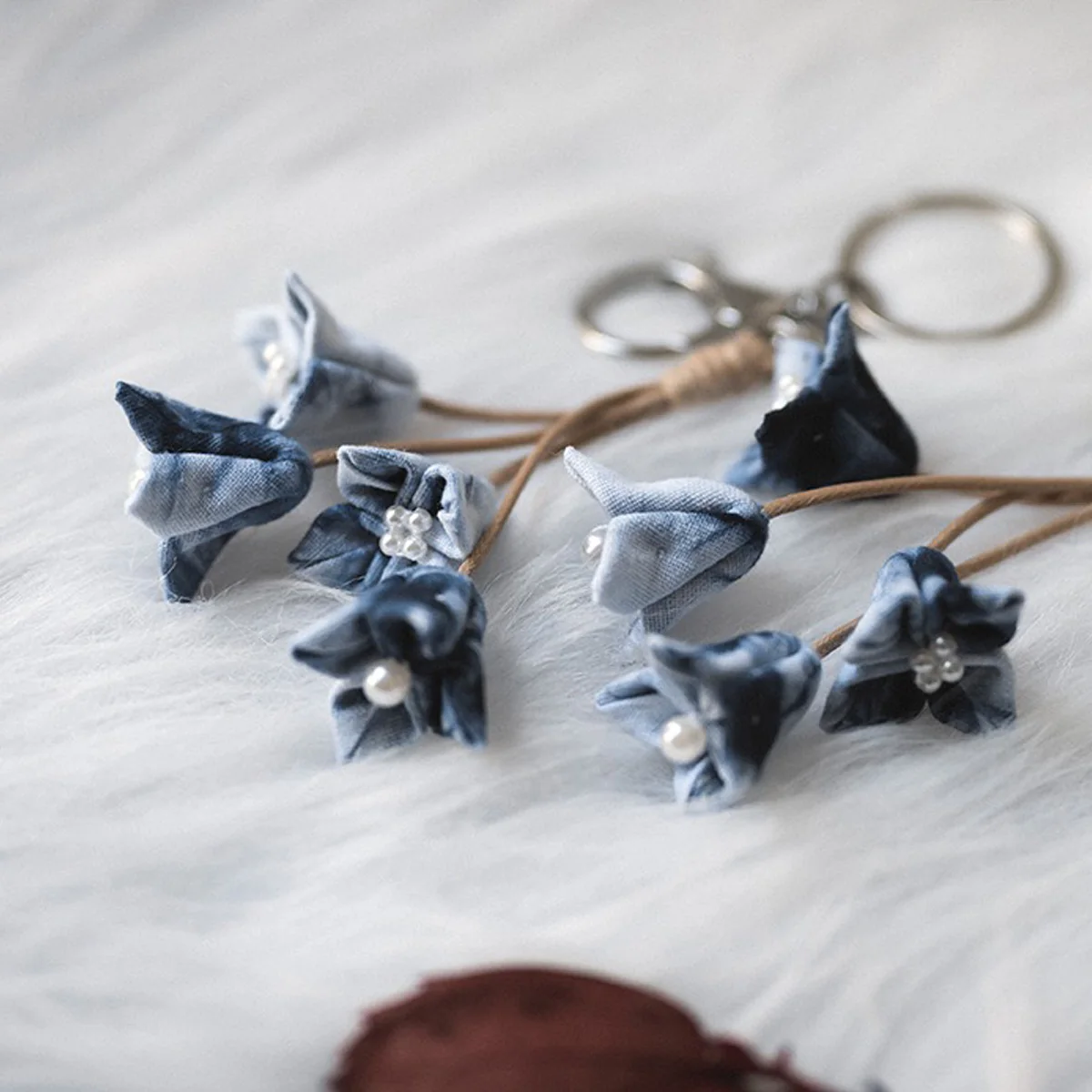 

Handmade blue tie dyed lily of the valley tulip keychain, for collection and gift giving