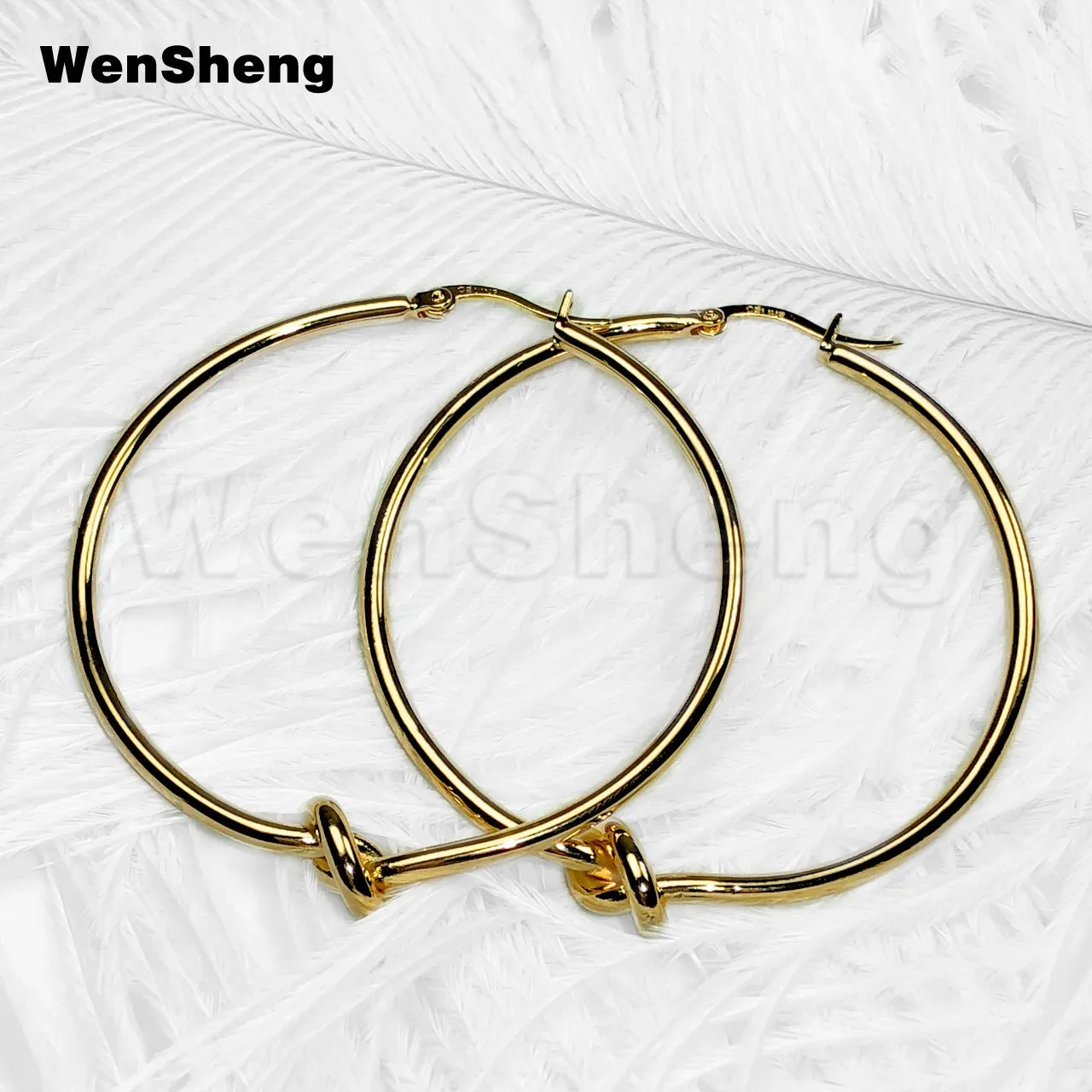 

Golden knot hoop earrings