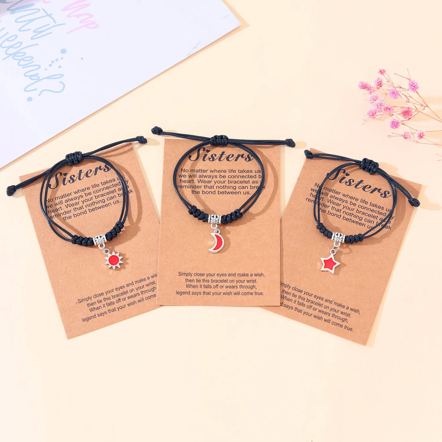 Wholesale of New Sun Moon Star Good Friend Bracelet with Simple Alloy Oil Dropping Hand Knitted Handrope