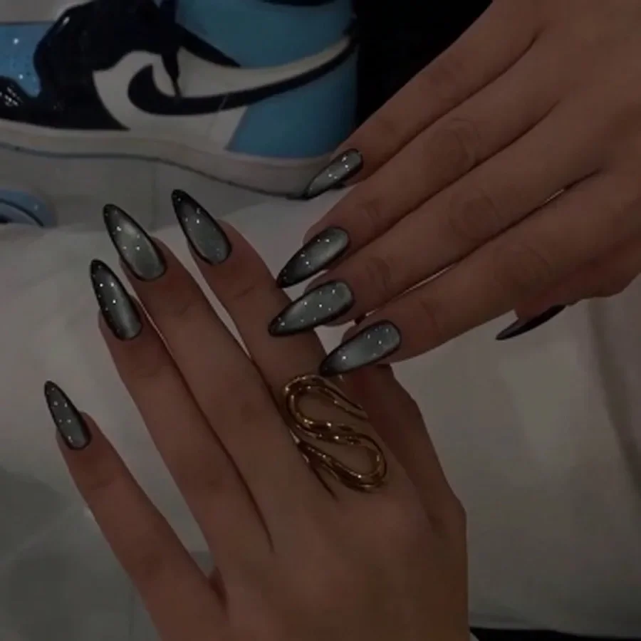 

A Box Of 30 Pieces Of Blue Solid Color Flash Cat's Eye Wearing A Nail With A Long Almond-Shaped Nail.