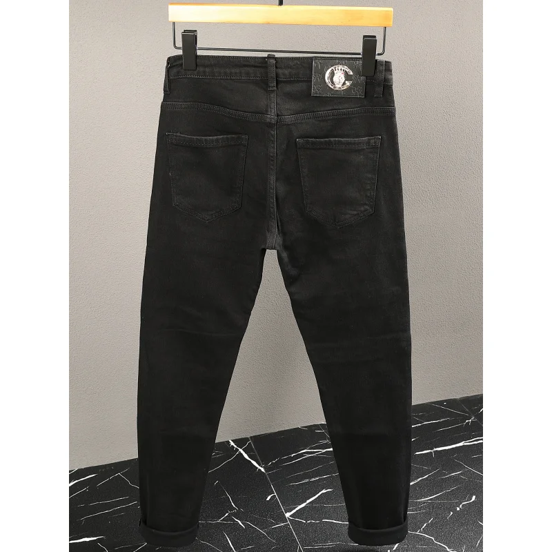 Handsome black jeans men's zipper decoration fashion trend street ripped patch small leg pants