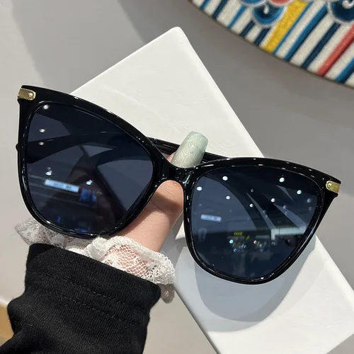 2025 Gafas de sol populares de diseño de ojo de gato, decoración de leopardo, gafas de sol con gradiente para mujer, gafas de sol de marca Ins, gafas de sol para dama