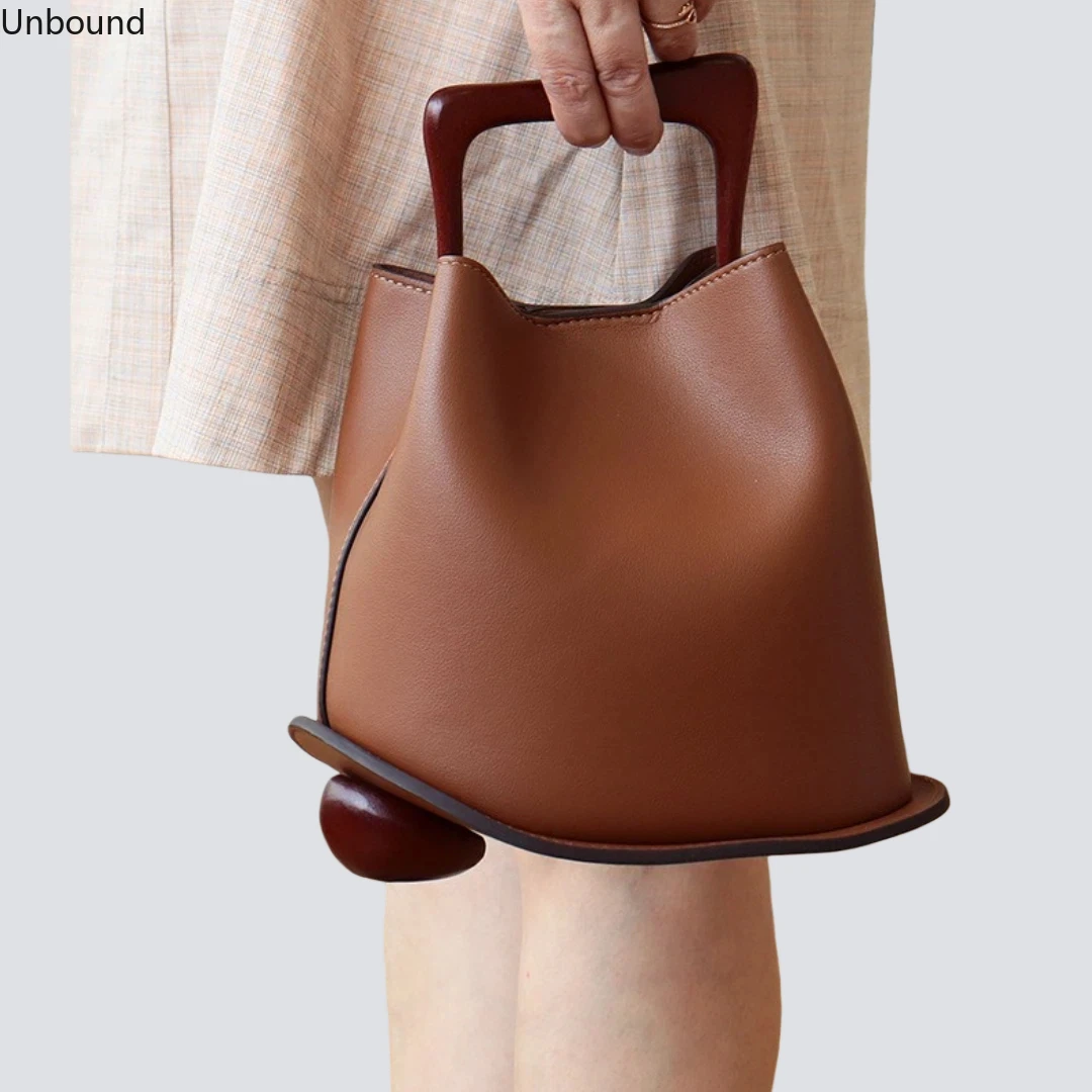 

New Genuine Leather Womens Bucket Handbag Wooden Handle Crossbody Commuter Versatile Unique Fashion Small Designer Tote 2026 Hot