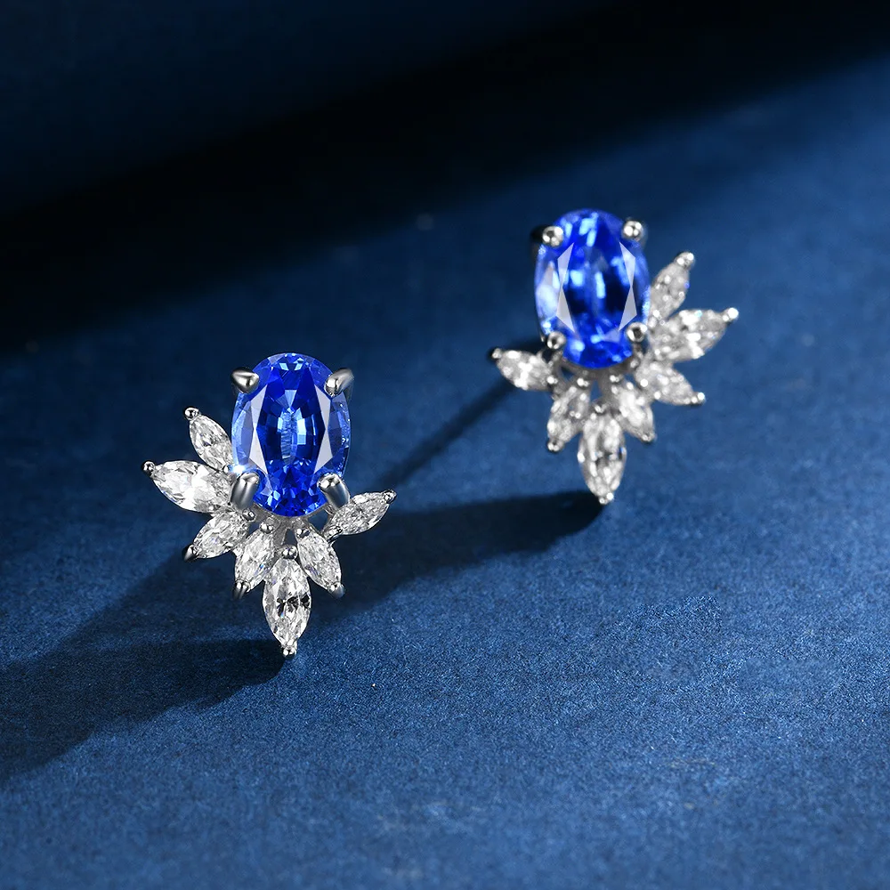 

New S925 silver inlaid 5 * 7 egg shaped 2.5ct sapphire cornflower blue fashionable temperament AB style earrings wedding jewelry