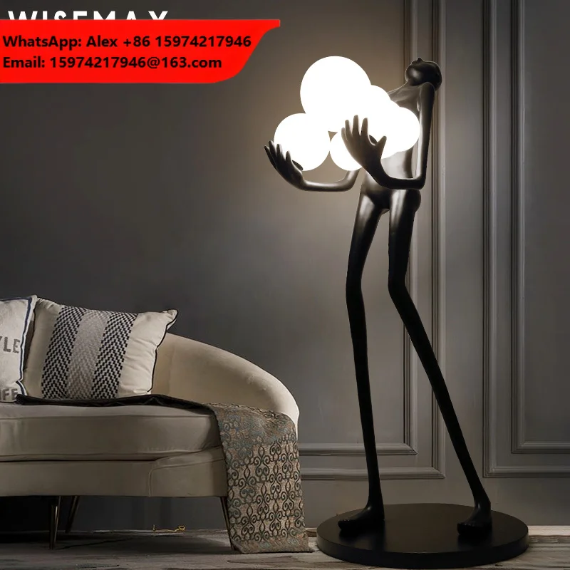 WISEMAX FURNITURE Creative Living Room Lamp Modern Nordic Hotel Atmospheric Human Body Sculpture Holding Ball Resin Floor Lamp