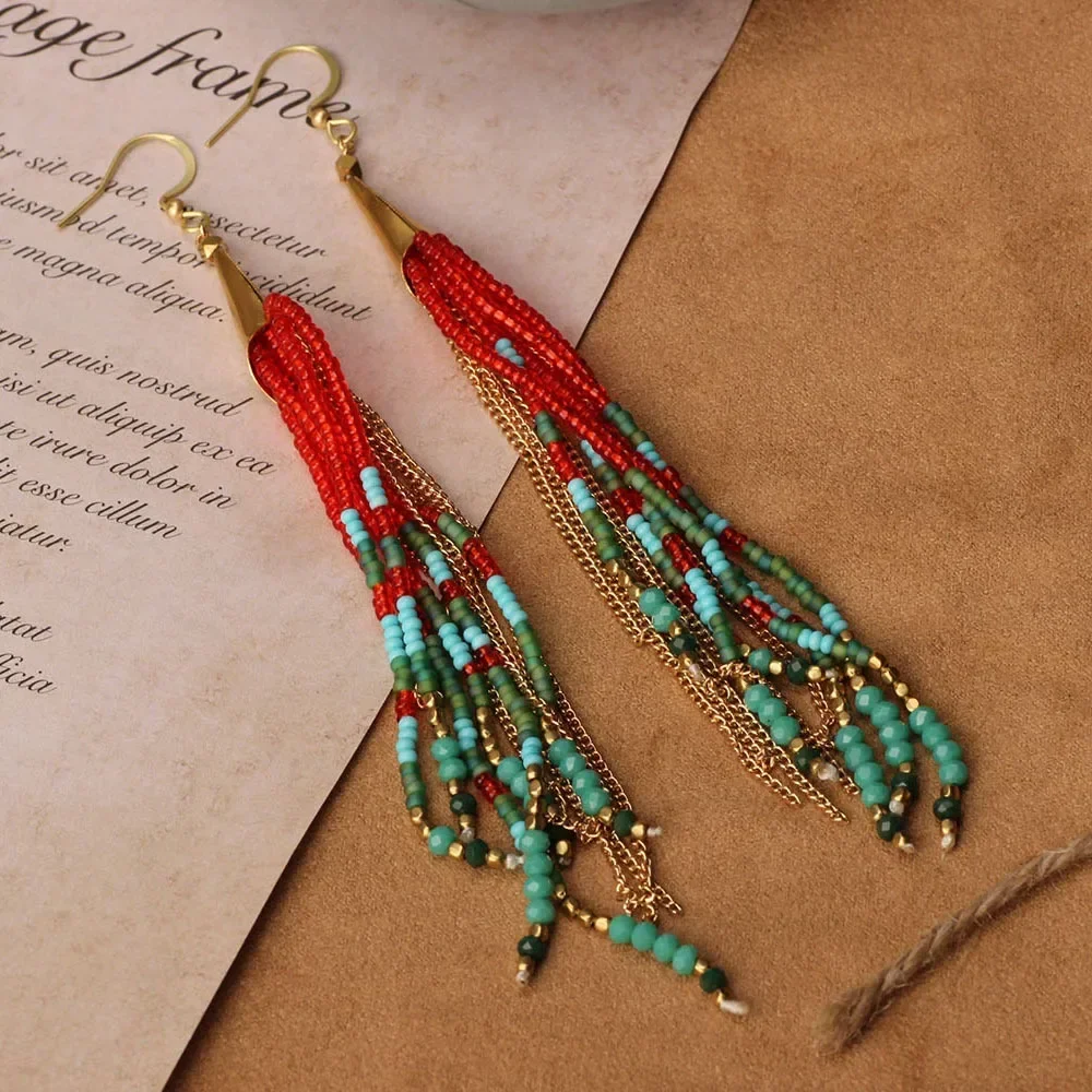 Beaded earrings Nation Tide Tassel Hand knitting Individuality Bohemia Simple Female Originality Alloy Rice bead earrings
