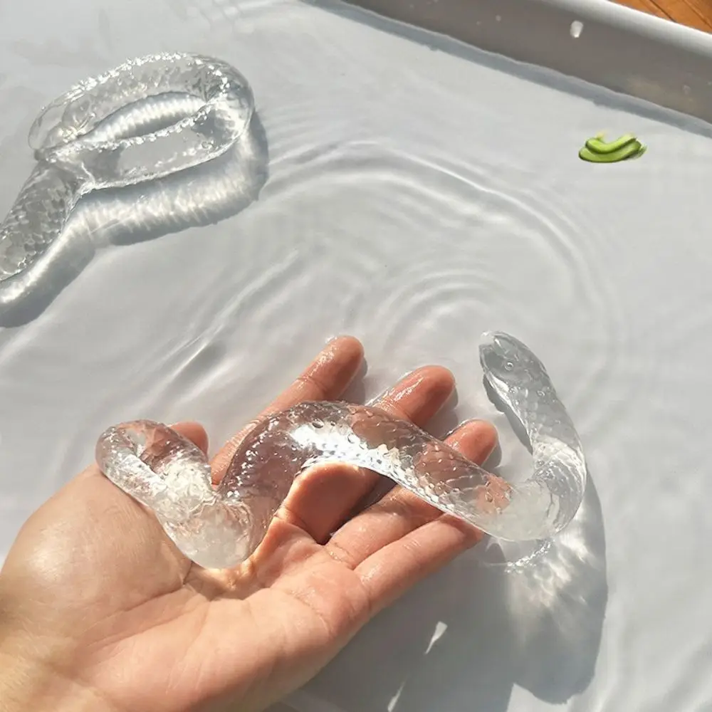 2025 透明ヘビ解凍おもちゃソフトストレスリリーフヘビピンチおもちゃ TPR スクイズシミュレーションヘビ置物ギフト