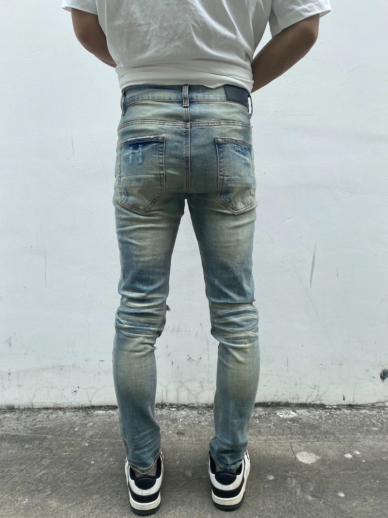 Zerstörte zerrissene Löcher Patckwork Denim Jean Herren lässig Distressed gewaschene Biker Jeans neue Mode High-Street schlanke Hosen Jogger