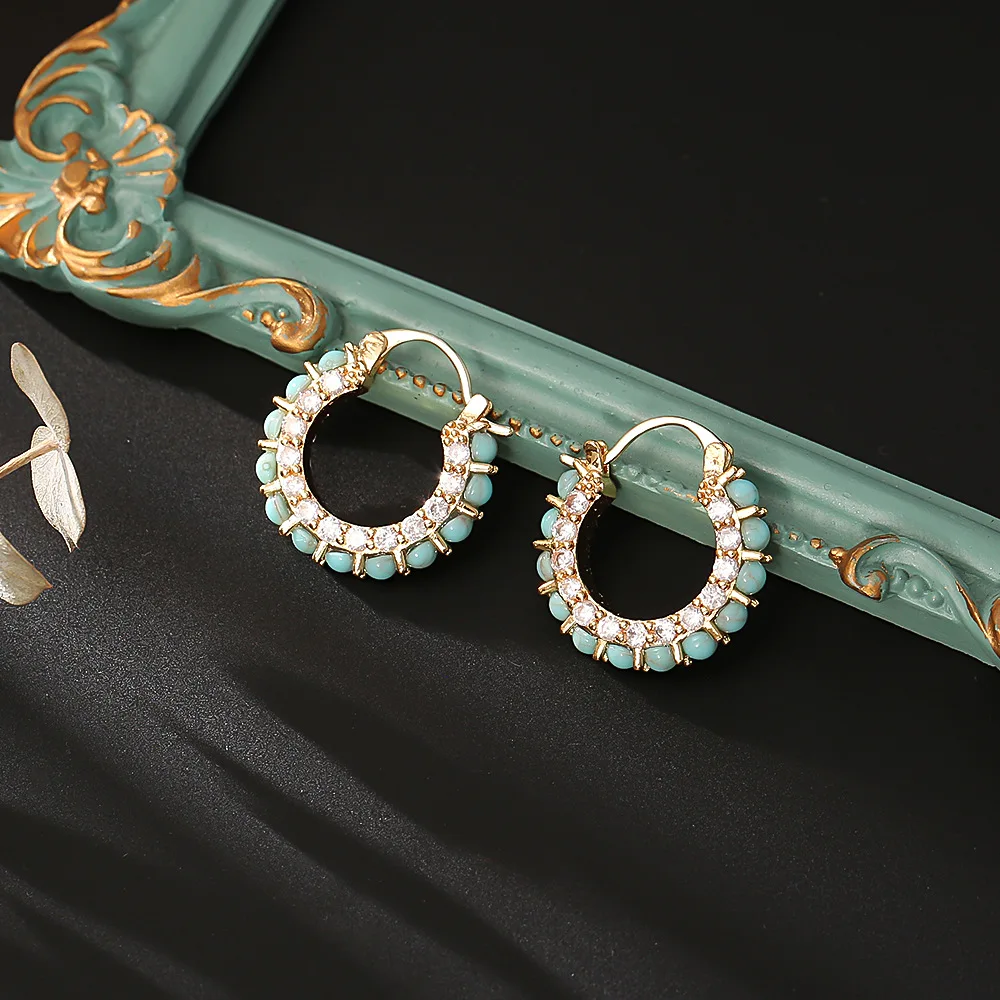 

Light luxury, high-end turquoise earrings, niche design, exquisite and versatile zircon earrings, exquisite temperament earrings