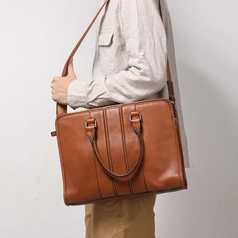 حقيبة جلدية أصلية للرجال ، حقيبة كتف ذات سعة كبيرة للعمل مع مقصورة للكمبيوتر المحمول