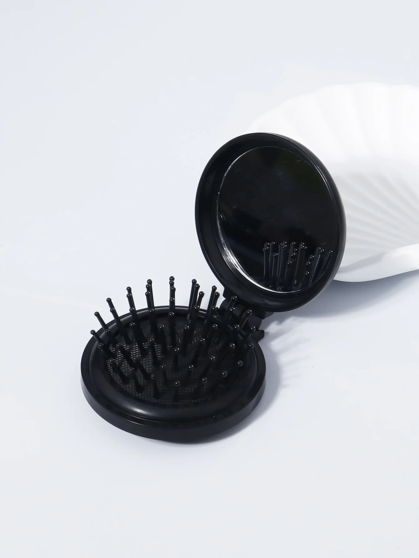 

1pcs portable mini folding comb head massager mirror airbag comb anti-static travel hair styling comb Special for real hair wigs