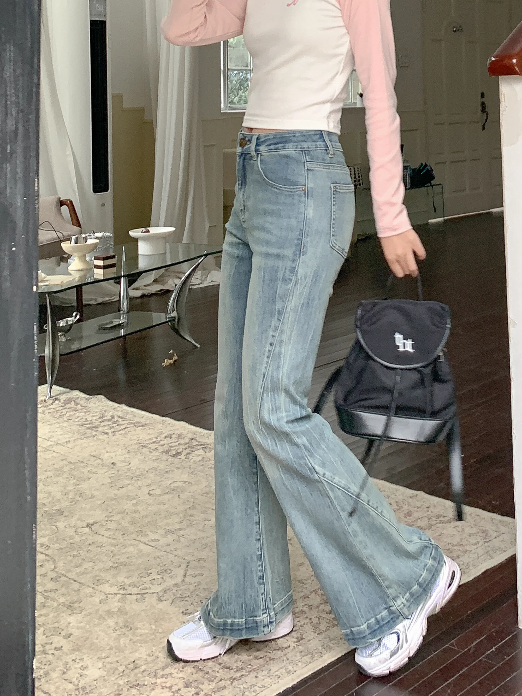 

Spring Fashion Ladies Light Blue Flared Jeans Natural Waist Denim Fabric Zipper Closure Casual Ladies Jeans Spring Collection