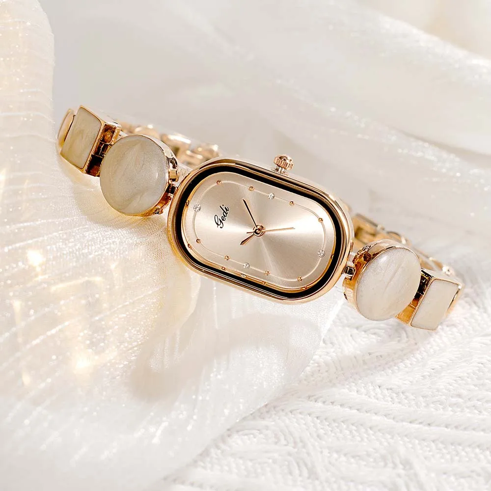 ساعة كوارتز نسائية من GEDI بسوار بيضاوي رائع وبسيط مع تصميم فريد من نوعه غير منتظم وفني ساعة كوارتز للسيدات