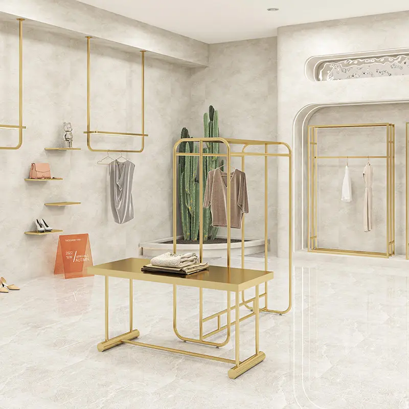 Clothing store window display rack with lamp hanging on the wall Stainless steel gold middle island hanging clothes rack shoe