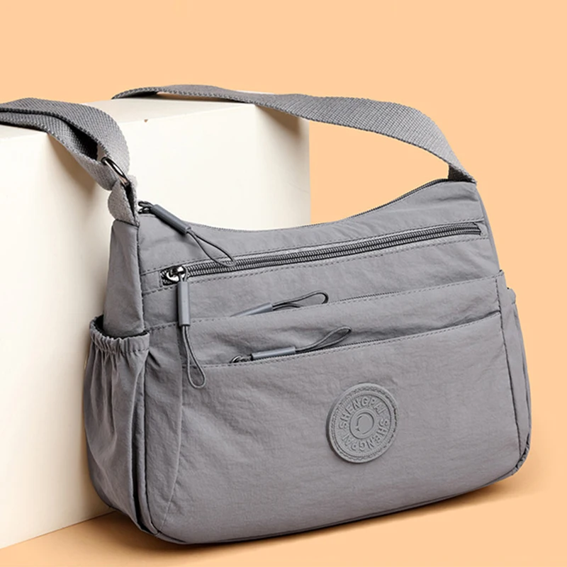 

Multi-Layer Casual Lightweight Shoulder Messenger Bag for Women Solid Color Multipocket Middle-Aged and Elderly Mother Bag