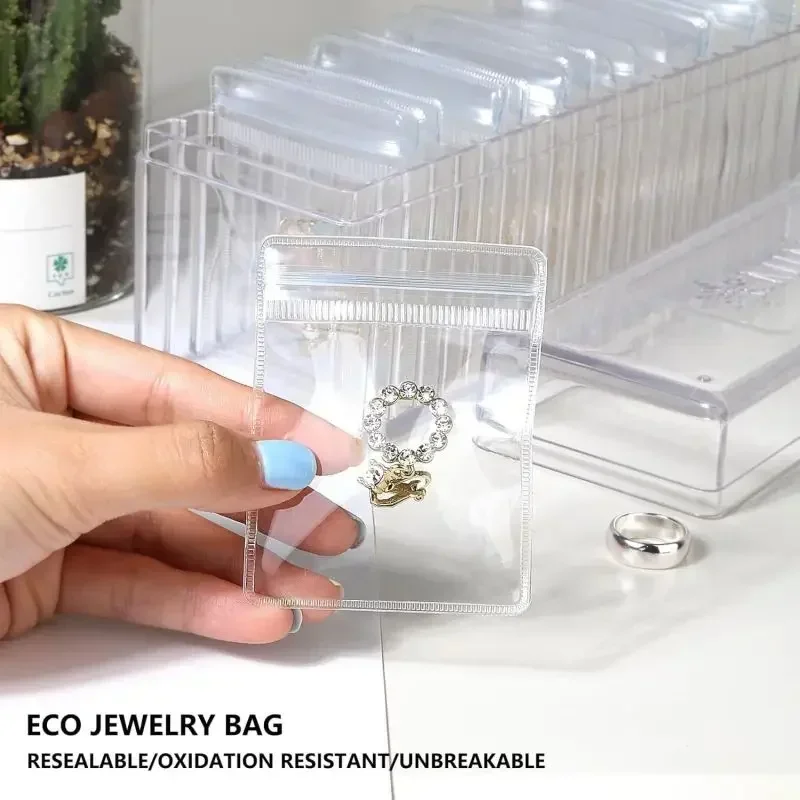 

Acrylic Jewelry Box Organizer with 20 Portable Anti Tarnish Jewelry Bag Earring Rings Necklace Jewellery Case Anti-Oxidation Bag