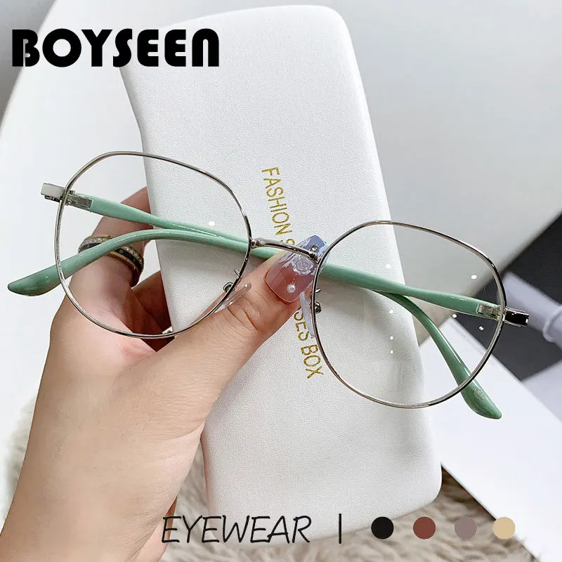 Boyseen แว่นตากันแสงสีฟ้าทำจากโลหะใหม่โปร่งใสแฟชั่นกรอบแว่นกลมย้อนยุคแว่นตาเรียบง่าย