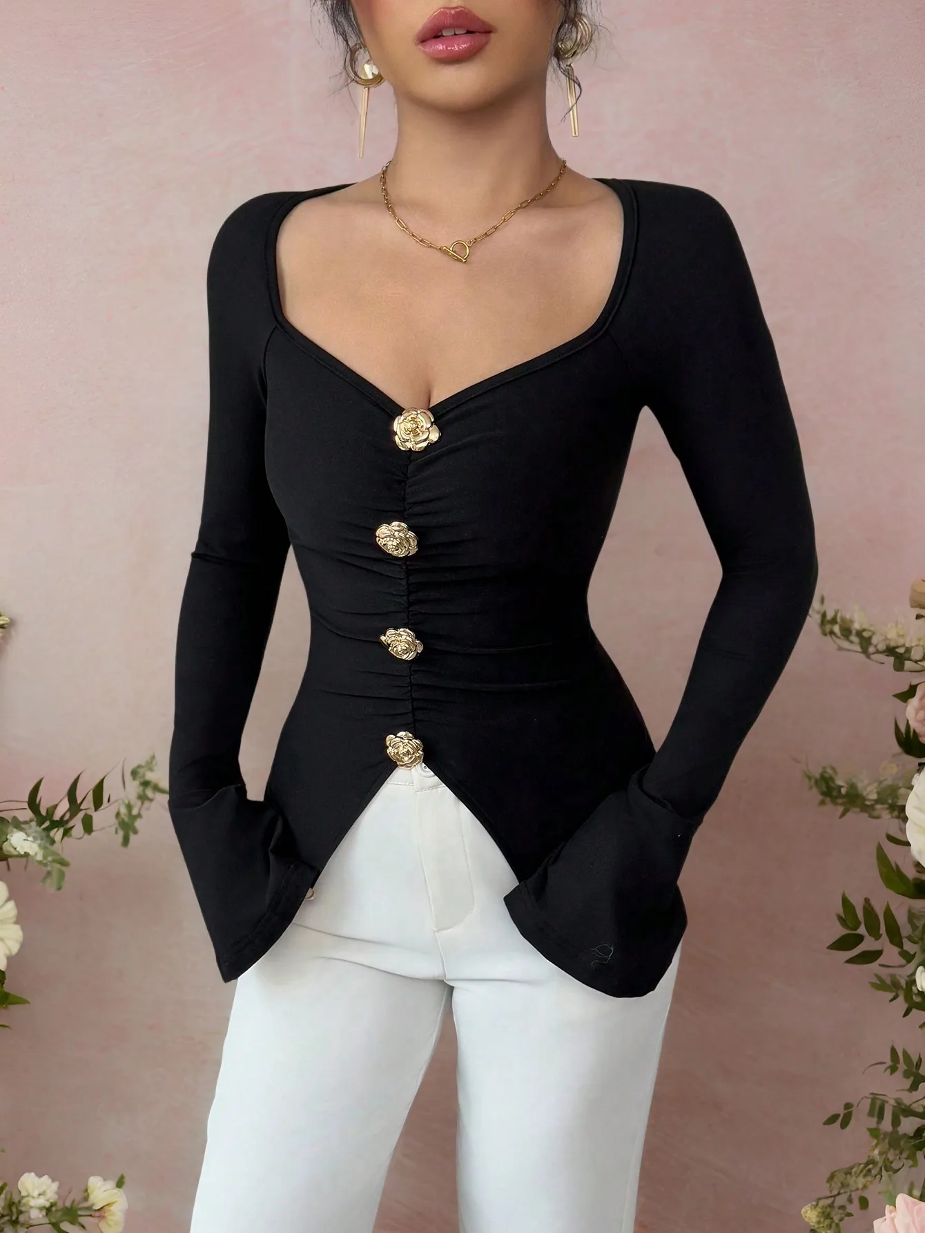 

Black Fitted Long Sleeve Top with Gold Rose Buttons and Flared Cuffs