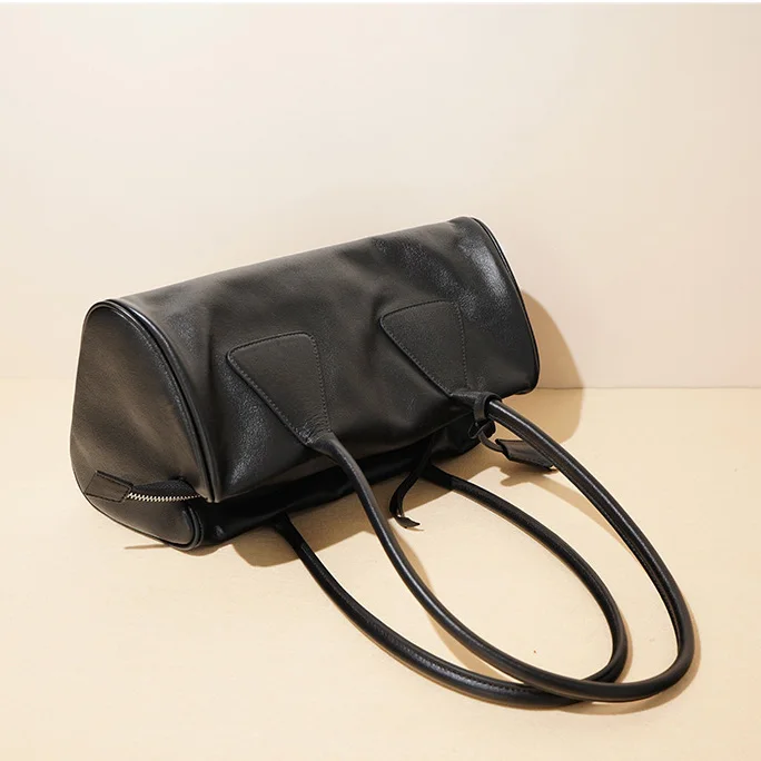 Genuine leather cowhide single shoulder armpit retro baguette bag for women's new high-end triangle bag handbag