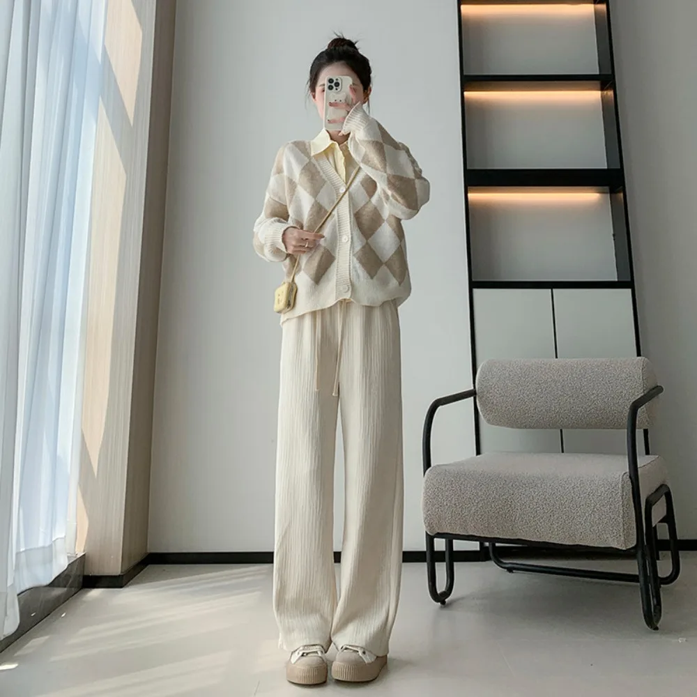 Damskie spodnie na lato 2025, nowe, ze sznurkiem, cienkie, z elastyczną gumką w pasie, miękkie, szerokie nogawki, długie, luźne, różowe, odzież damska.