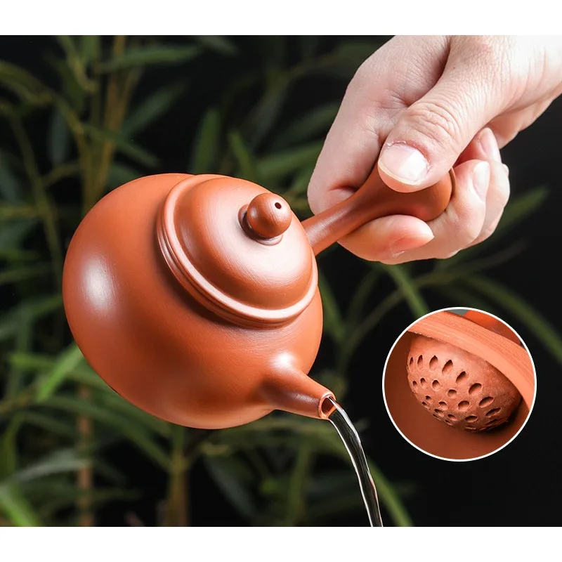 Chaozhou Zhu Ni Hand Pulled Pot Side Handle Purple Clay Pot Can Cut Water Kung Fu Tea Set Ball Hole Filter Foam Tea Pot