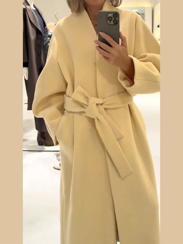 เสื้อโค้ทขนสัตว์แบบยาวสำหรับผู้หญิง ทรงหลวม แขนยาว คอวี ติดกระดุมผูกเชือก สีเบจ แฟชั่นสำหรับผู้หญิง เสื้อคลุมกันหนาว