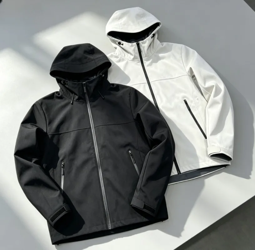 Hooded hard-shell windproof waterproof jacket for men women, casual business outdoor coat, durable comfort wear.