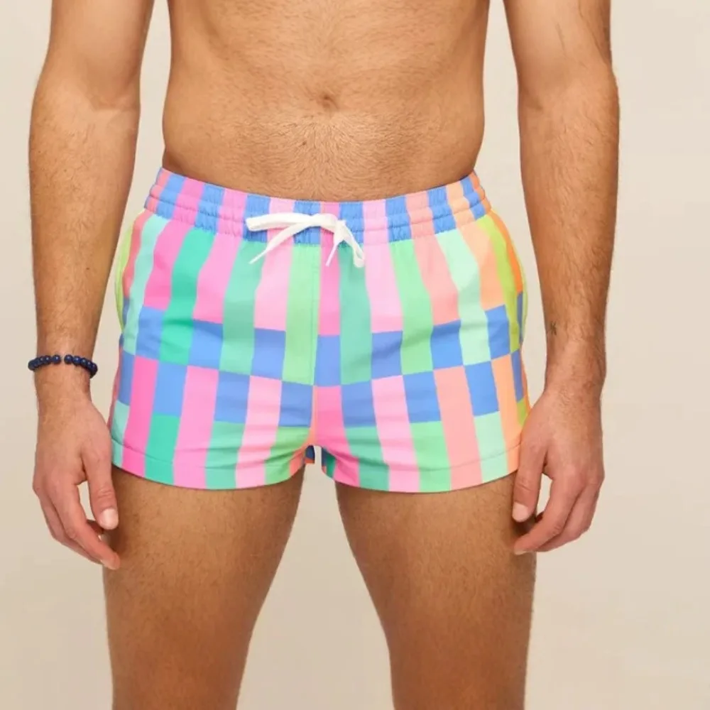 2026Color checkered drawstring quick-drying men's beach swimming trunks loose three-point shorts are sent on behalf of others.