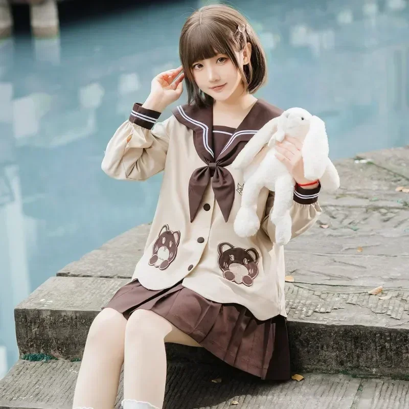 Uniforme pieghettata femminile estiva a maniche 2023 Sailor Cute Tie Girl Long Kawaii Brown con tuta da studente a orso corto