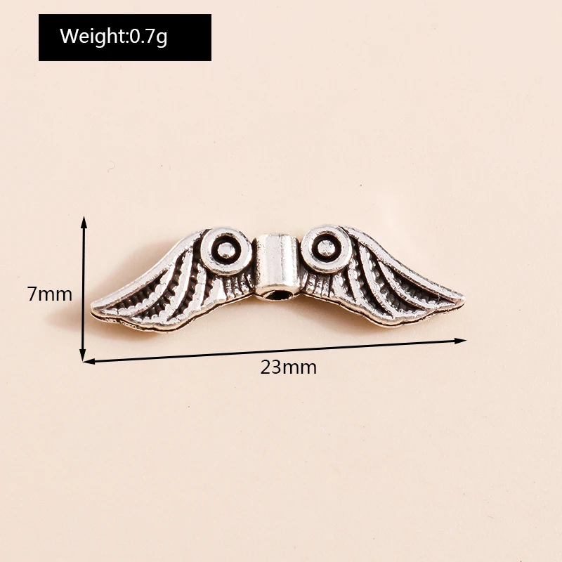 Leslie 40 Stück 7 x 23 mm Vintage Federflügel Charms Perlen für Anhänger Halsketten handgefertigte Armbänder Schmuckherstellung Zubehör – Detail 1