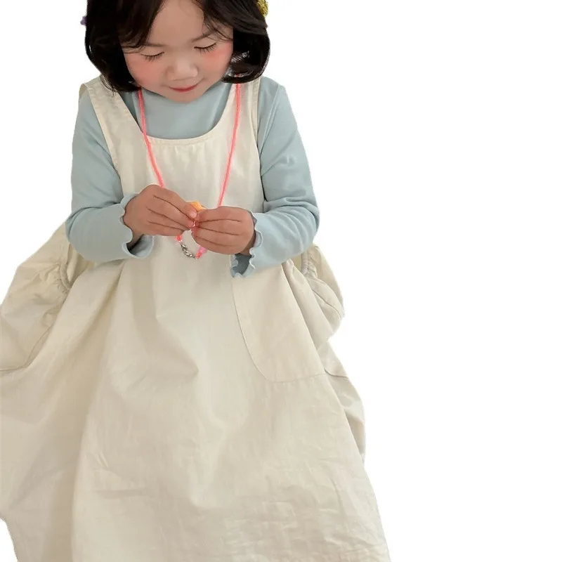 تنورة سترة مكدسة بجيب للفتيات للربيع والخريف منتج جديد ملابس أطفال فستان بسيط بلون واحد للأطفال