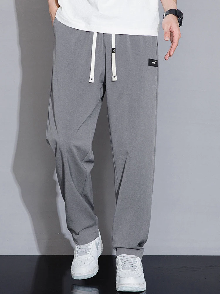 

2025 Men's Casual Straight Pants Elastic Waist Jogger Korean Classic Blue Black Gray Male Brand Trousers Plus Size 4XL 5XL