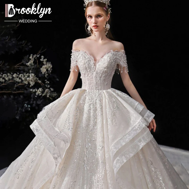 Sexy Delicate V-neck Bridal Dress Shiny Crystal Applique Backless Beaded Prom Dress Tulle Sweetheart Quinceanera Dresses