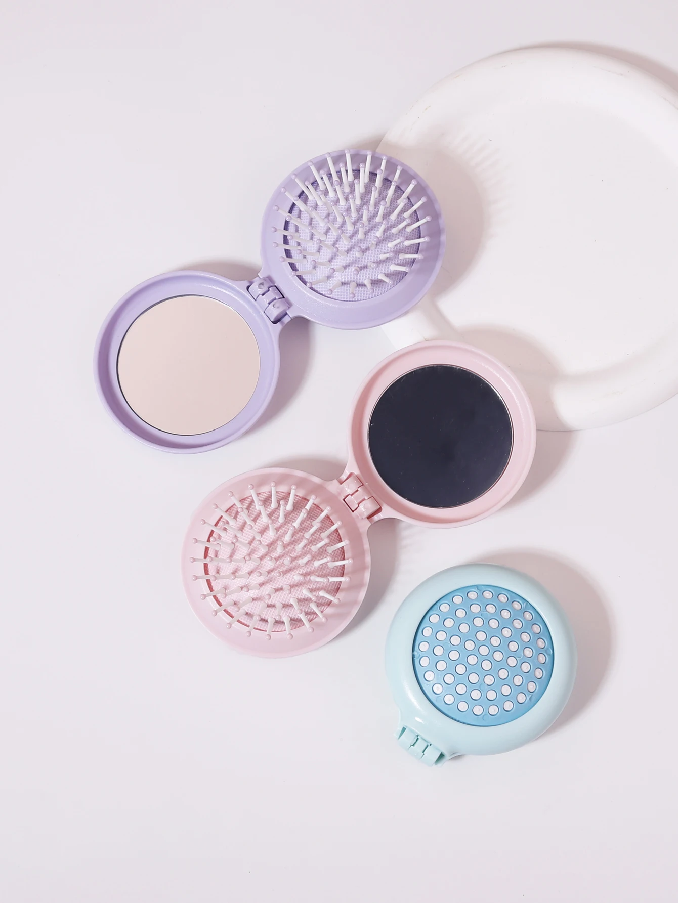 

portable circular pocket comb with mirror hairstyle folding mirror plastic air cushion massage comb Special for real hair wigs
